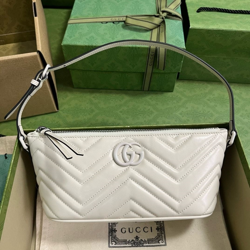 G*u*i top handle bags